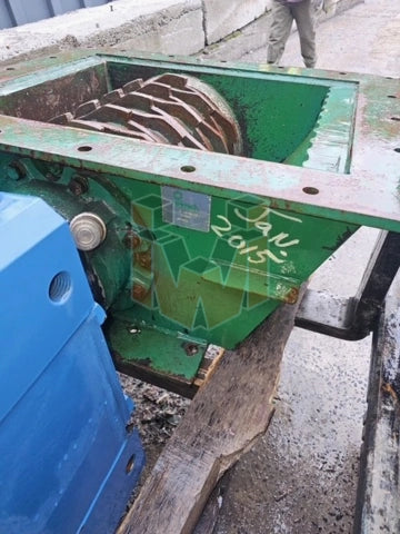 Helmick single roll crusher