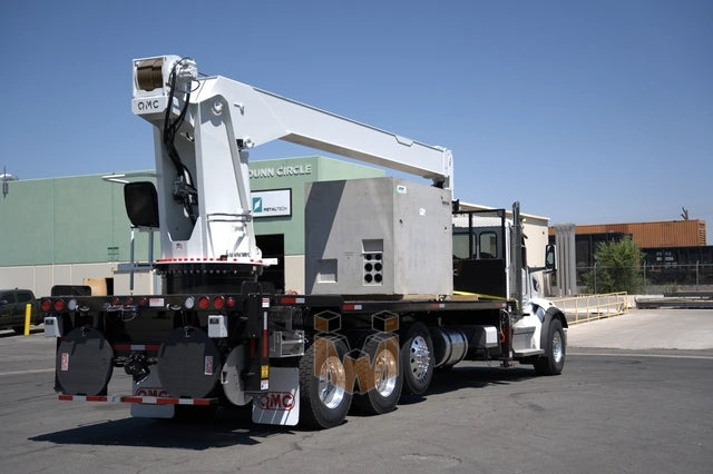 Peterbilt 567 truck with QMC 5037R Rear Mounted Boom Crane