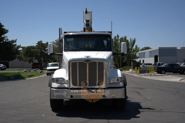 Peterbilt 567 truck with QMC 5037R Rear Mounted Boom Crane