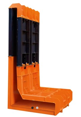 Precast concrete L-shaped retaining wall used for bulk material separation and site support.