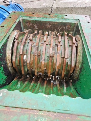 Helmick single roll crusher